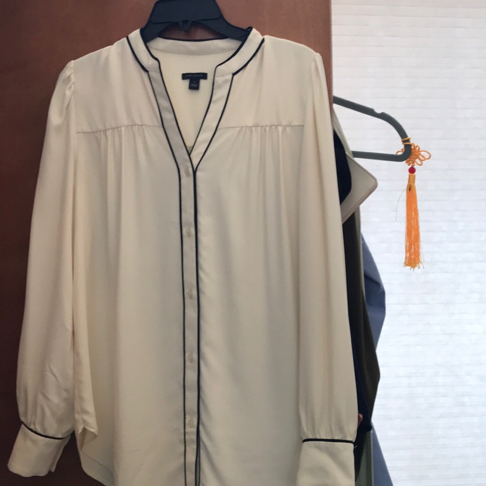 Ann Taylor cream blouse with black piping